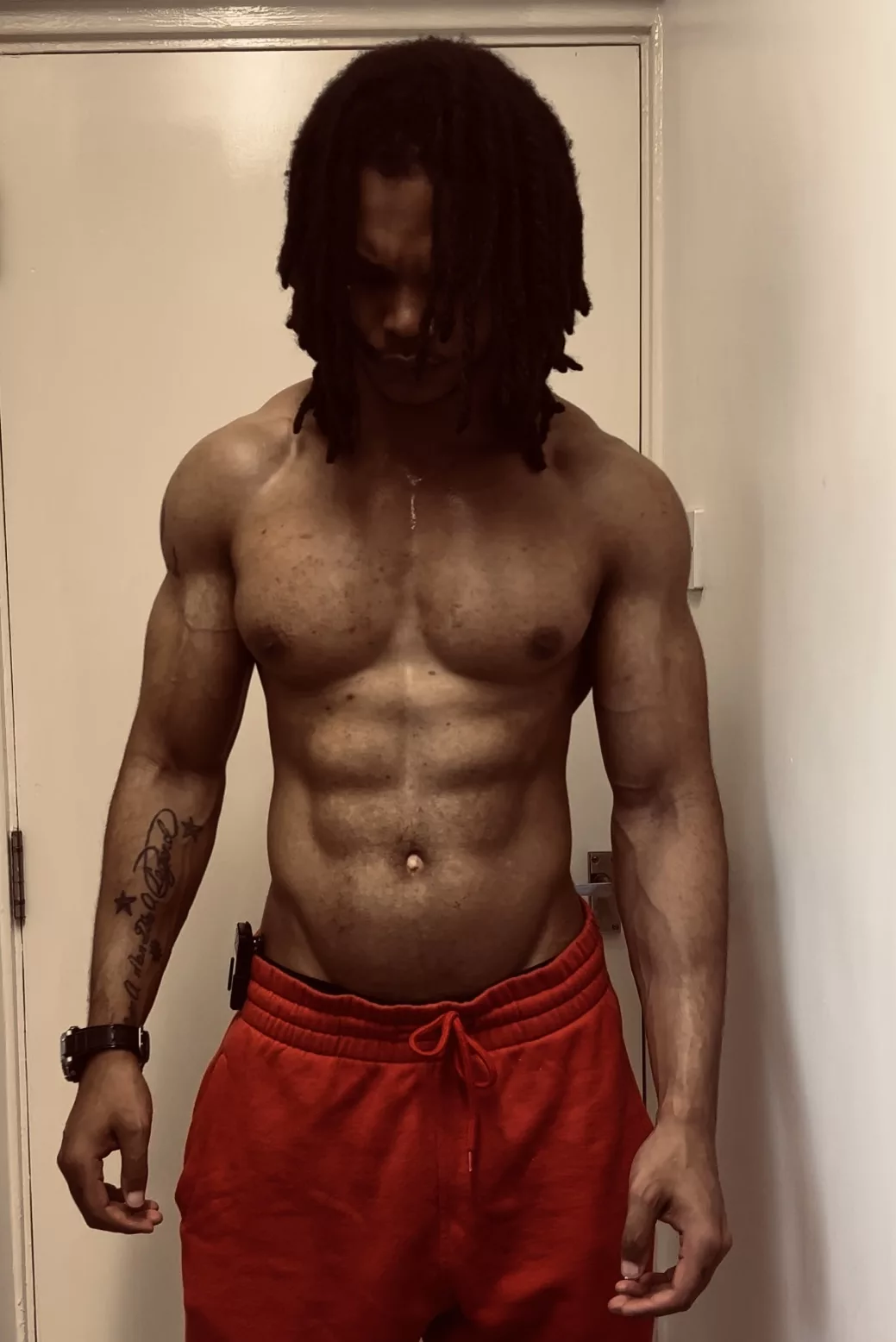 jay cartere toned physique while topless