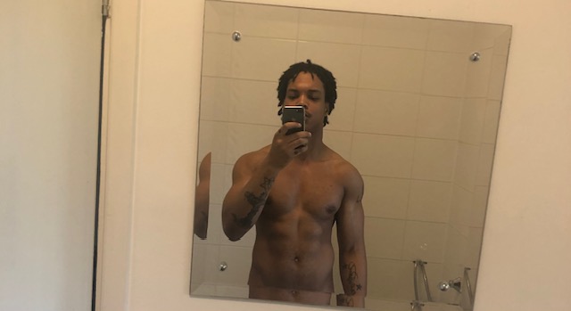 man showing how long it takes to get lean